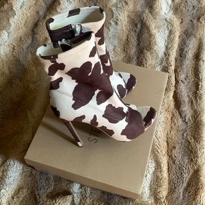 Cow hide print heel boots by Steve Madden